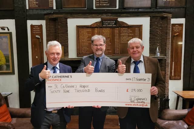 Duncan Ponikwer and Dave Owen from the St Catherine’s Golf Society with Giles Tomsett, Chief Executive of St Catherine’s Hospice and presenting a cheque for £29,000 they raised for the hospice last year