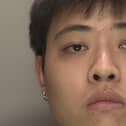 Officers are searching for Jie Lin, 21, who is wanted on recall to prison. Photo: Sussex Police