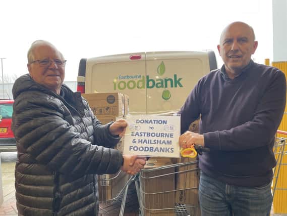 Bob Lewis of Medi Tech Trust making the presentation to Howard Wardle, CEO of Eastbourne Foodbank