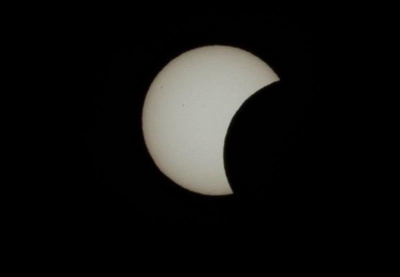 The partial solar eclipse.