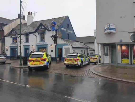 Multiple police vehicles were seen outside the Crown & Anchor pub in Shoreham’s High Street