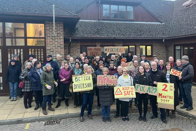 Hundreds of residents turned up for a meeting in Pulborough protesting at the length of time the A29 has been shut in the village following a landslide