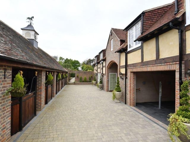 There is a ground floor stable block with heated rug room, laundry room, bathroom and horse washdown bay. There is also a heated tack room, boiler room, tractor barn, machine room and tool shed. The first floor stable block includes two apartments, as well as a coach house bedroom.