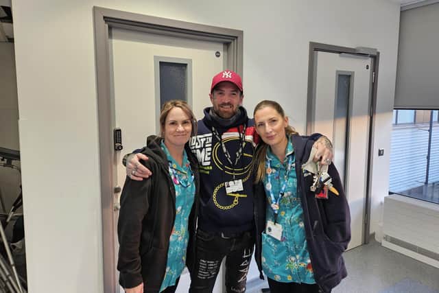 Jay Jones with two nurses from the children's ward at the Conquest Hospital