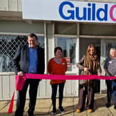 Charity Shop Girl Jen Graham cuts the ribbon to officially open the new Guild Care shop in Southwick
