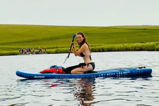 Hannah Donohoe out paddleboarding in Cuckmere Haven with Dash the sausage dog (photo from Hannah Donohoe)