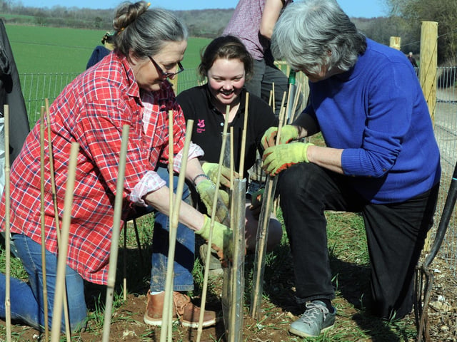 Warden Gabby Crisp, centre, with Debbie King and Helen Westcombe, daughters of Maggie Smith, who left a legacy that was put towards new hedging