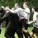 Horsham YMCA celebrate v Roffey as they reach the RUR Cup final | Picture: Beth Chapman