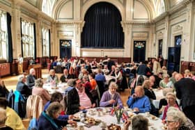 Guests seated in the Assembly Rooms at Lewes Town Hall at the 2023 Seniors Spring Tea