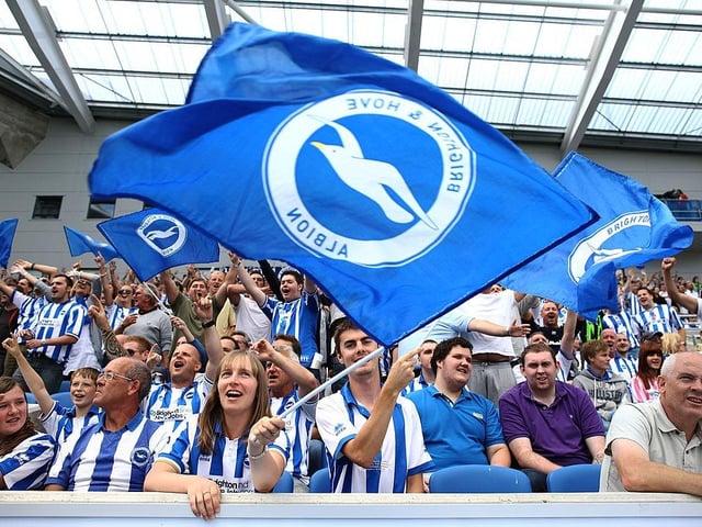 Brighton & Hove Albion supporters cheer their team during the npower Championship match between Brighton & Hove Albion and Blackpool at Amex Stadium on August 20, 2011.
