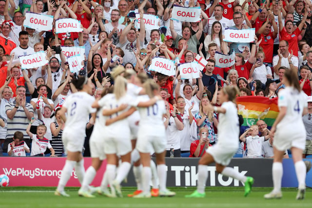 England fans celebrate after their side's third goal.