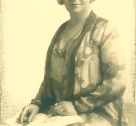 Marian Frost, Chief Librarian and Curator, Worthing Library. Formal photographic portrait circa 1935.