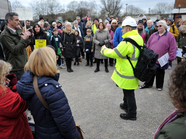 Attendees of the demo stopping to listen to a speaker. Pic S RobardsSR2303061