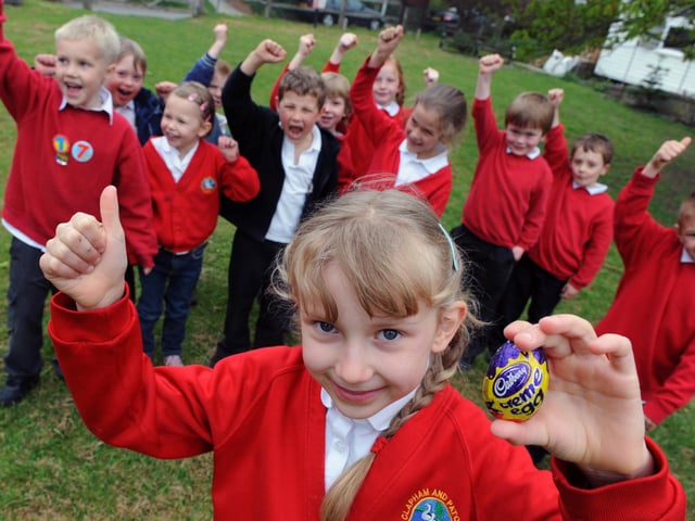 Freya West with her egg and other pupils taking part in an Easter egg hunt at the school in 2009