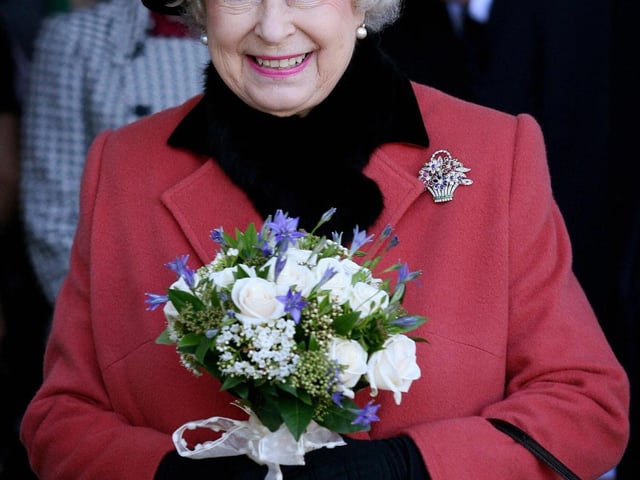 Queen Elizabeth II visits the Thomas Bennett Community College in Crawley. AFP PHOTO/Gareth Fuller/WPA ROTA