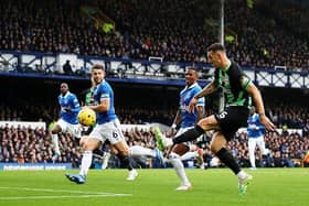 Lewis Dunk of Brighton & Hove Albion scores a goal that is later ruled offside during the Premier League match at Everton