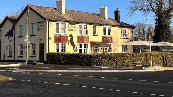 The Black Horse pub near Gatwick Airport has been put up for sale by owners Hall & Woodhouse