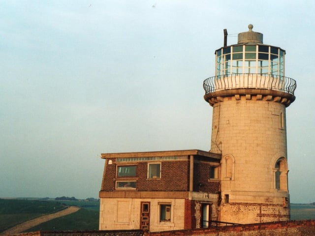 As a working lighthouse the 47 ft high Belle Tout lighthouse was situated on a promontory known as Belle Tout Down on Beachy Head cliffs, near Eastbourne in East Sussex.