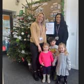 Operations manager Harriet Crouch (left) and nursery manager Elle Hill with three children (photo from nursery)