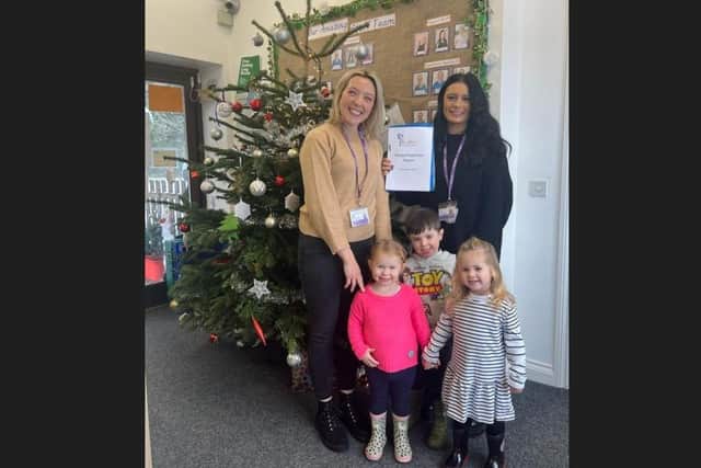 Operations manager Harriet Crouch (left) and nursery manager Elle Hill with three children (photo from nursery)