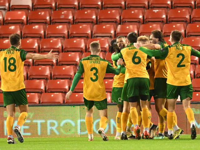 Shamir Fenelon of Horsham celebrates his goal to make it 1-1 during the Emirates FA Cup First Round match between Barnsley and Horsham at Oakwell Stadium.