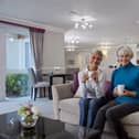 A typical warm and sociable Owners' Lounge at a Churchill Retirement Living development