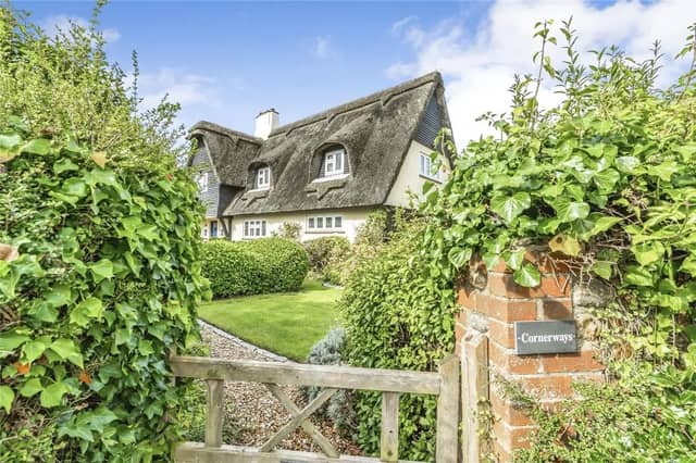 The thatched roof gives this home a distinct charm.