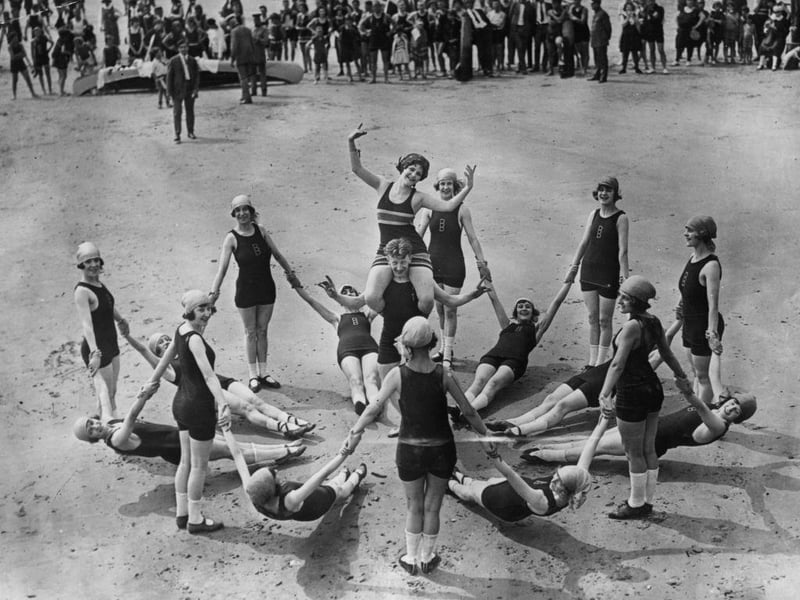 American dancer Madge Nerrit (centre) during a dance in her honour by a group of Tiller Girls on the beach at Brighton.