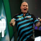 Rob Cross celebrates during last year's World Championships. (Photo by Tom Dulat/Getty Images)
