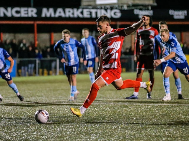 Action from Eastbourne Borough's home defeat by Torquay United in National League South