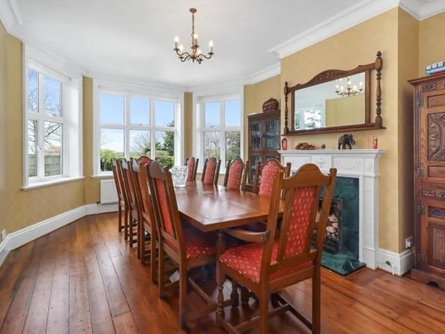 Features four reception rooms.