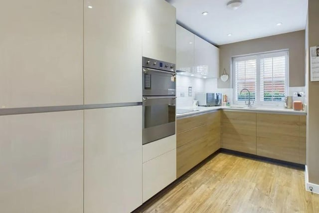 The Kitchen area is fitted with a stylish range of floor and wall mounted units which house a selection of appliances