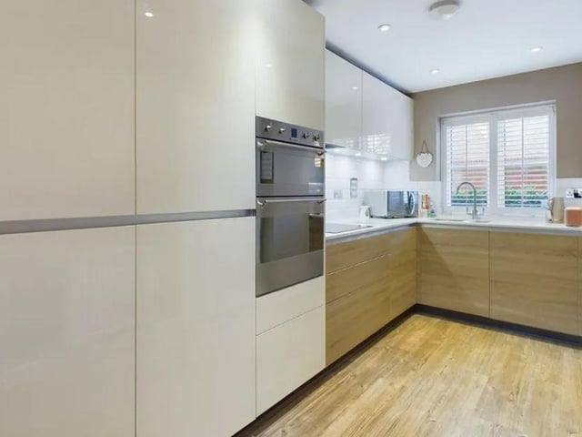 The Kitchen area is fitted with a stylish range of floor and wall mounted units which house a selection of appliances