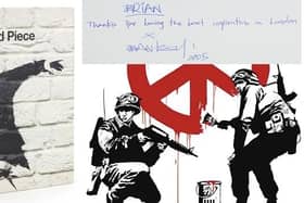 A unique book personally signed by the famous street artist Banksy is going up for auction in Eastbourne later this month. Picture: Eastbourne Auction