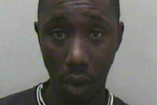 Sussex Police are searching for Alhagi Mbenga, 47, who is wanted on recall to prison. Picture courtesy of Sussex Police