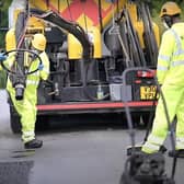 A highways crew hard at work repairing one of the county's roads. Picture: West Sussex County Council