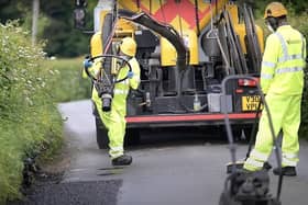 A highways crew hard at work repairing one of the county's roads. Picture: West Sussex County Council