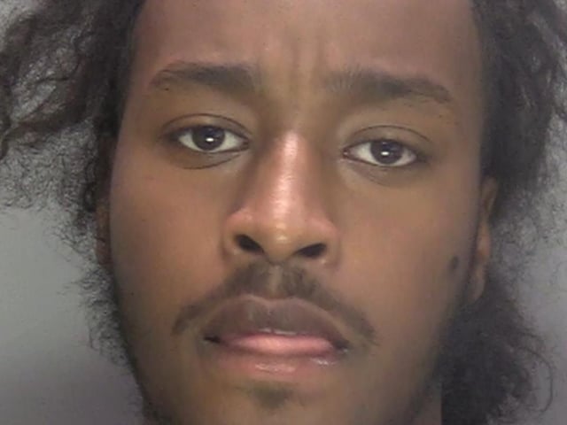 A drug dealer who tried to jump from a first floor window to evade arrest has been jailed. Mukhtar Abdullahi, 22, was linked to an address where suspected drugs deals were taking place in Horsham. Officers attended the address, linked to the “Kodak” drugs line, where cocaine, heroin, and cannabis were found inside. They safely detained Abdullahi and prevented his escape. At Lewes Crown Court on April 17 he appeared for sentencing after admitting being concerned in the supply of cocaine, heroin, and cannabis. Abdullahi, of no fixed address, was jailed for three years and eight months. The court was told how officers attended the address on October 22 last year in Swallowtail Road. Drugs were found inside the address, and Abdullahi was detained.