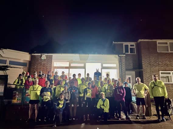 The Lewes AC runners outside the Landport Food Bank after dropping off their donations 
