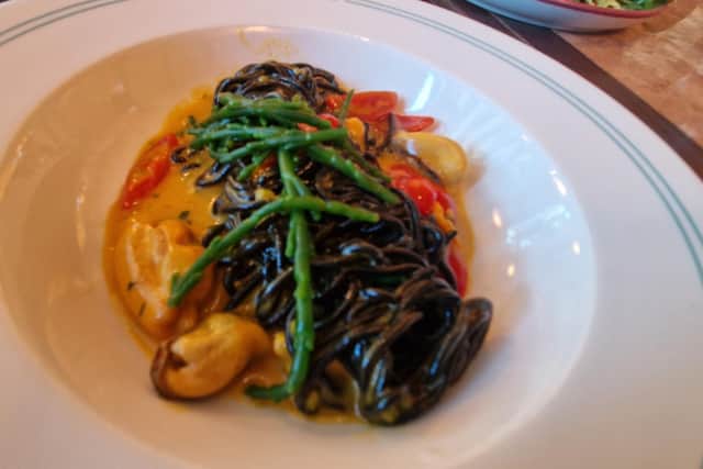 Spaghetti Nero, Mussels, Tomatoes, Saffron at Tutto