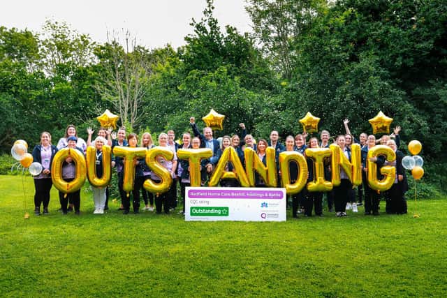 Local staff at Radfield Home Care celebrate after being rated as 'outstanding' by the CQC