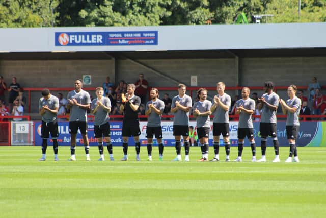 Crawley Town players line-up before the QPR game on Saturday. Picture by Cory Pickford