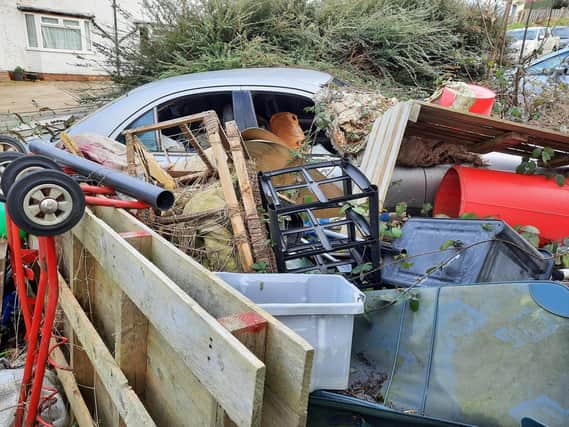 The property in East Dean Rise became known as the ‘junkyard garden’ due to the large quantity of debris that filled the front, rear and side of the house.