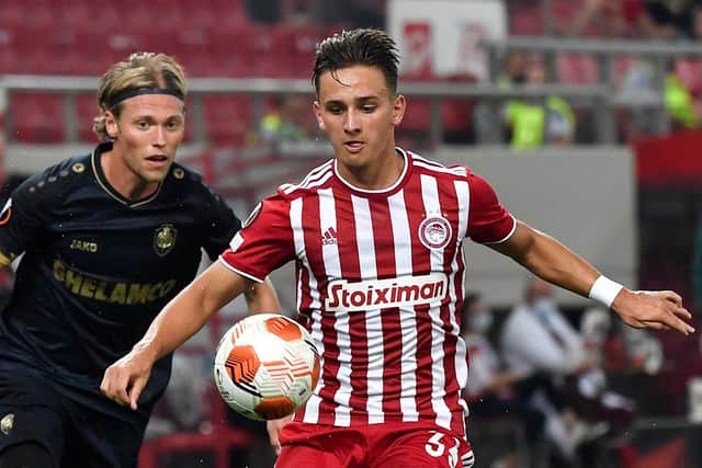 Polish international defender Michał Karbownik, pictured while on loan at Greek club Olympiacos last season, is among a number of Brighton & Hove Albion fringe players who are poised to leave the club this summer. Picture by LOUISA GOULIAMAKI/AFP via Getty Images