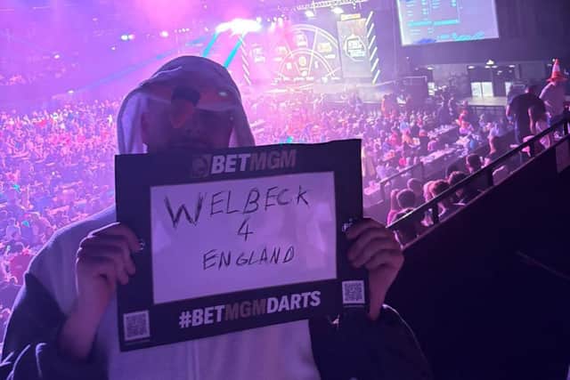 Ben Miller, dressed as a seagull, held up a sign at the darts, calling for Brighton striker Danny Welbeck to be picked for England's World Cup squad. (Photo contributed)
