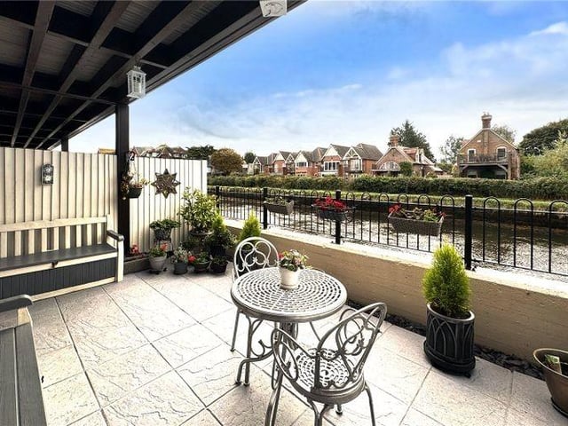 This luxury riverside townhouse with sweeping river, castle and cathedral views has come on the market with Graham Butt Estate Agents priced at £950,000 ,