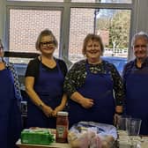 Manager Louise Dawkes, third left, and other volunteers at LA Second Chance Café. Picture: Kerry Stark