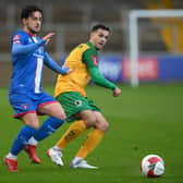 CARLISLE, ENGLAND - NOVEMBER 06: Carlisle player Zach Clough (l) challenges Horsham player Tom Kavanagh during the  Emirates FA Cup First Round match between Carlisle United and Horsham at Brunton Park on November 06, 2021 in Carlisle, England. (Photo by Stu Forster/Getty Images)