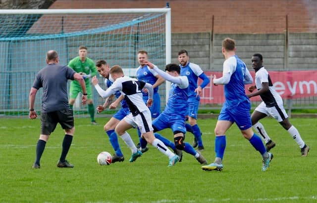 Action from Shoreham's 1-0 win over East Preston at Middle Road in division one of the SCFL
