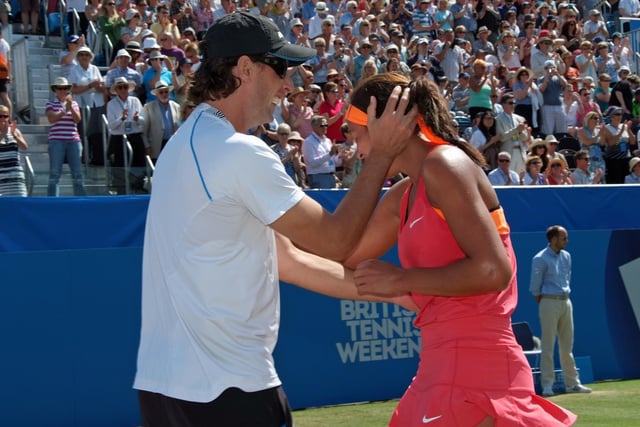 Champion Madison Keys is congratulated by her coach